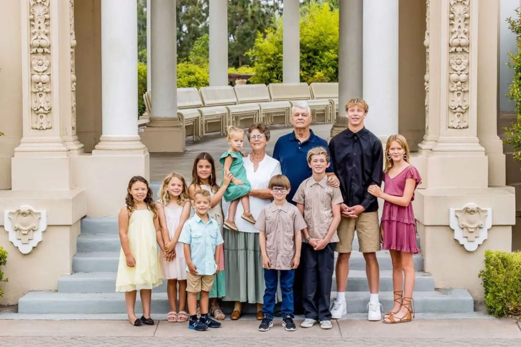 Grandparents with their grandchildren posing for their family shoot