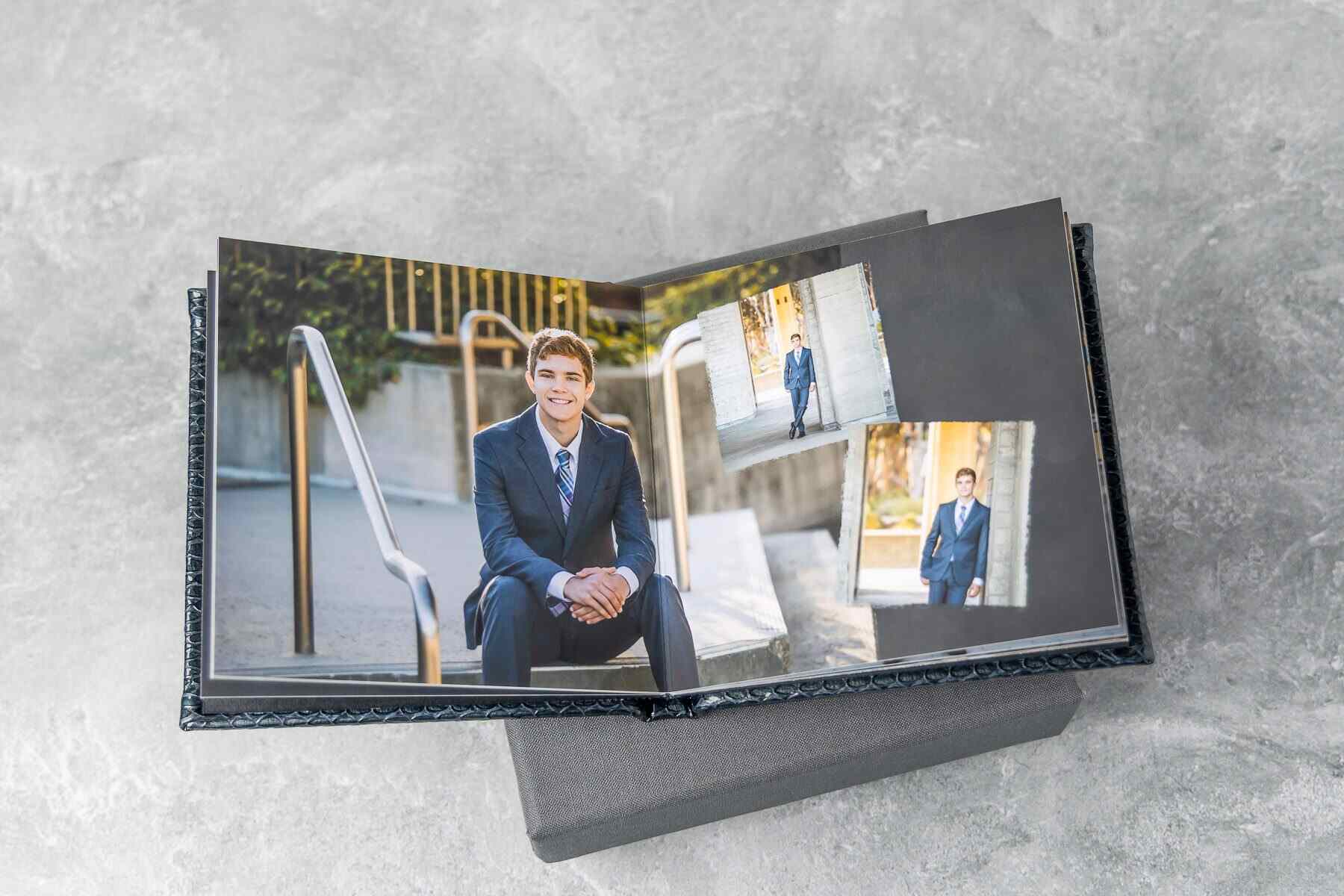 A black album with senior portraits of a student