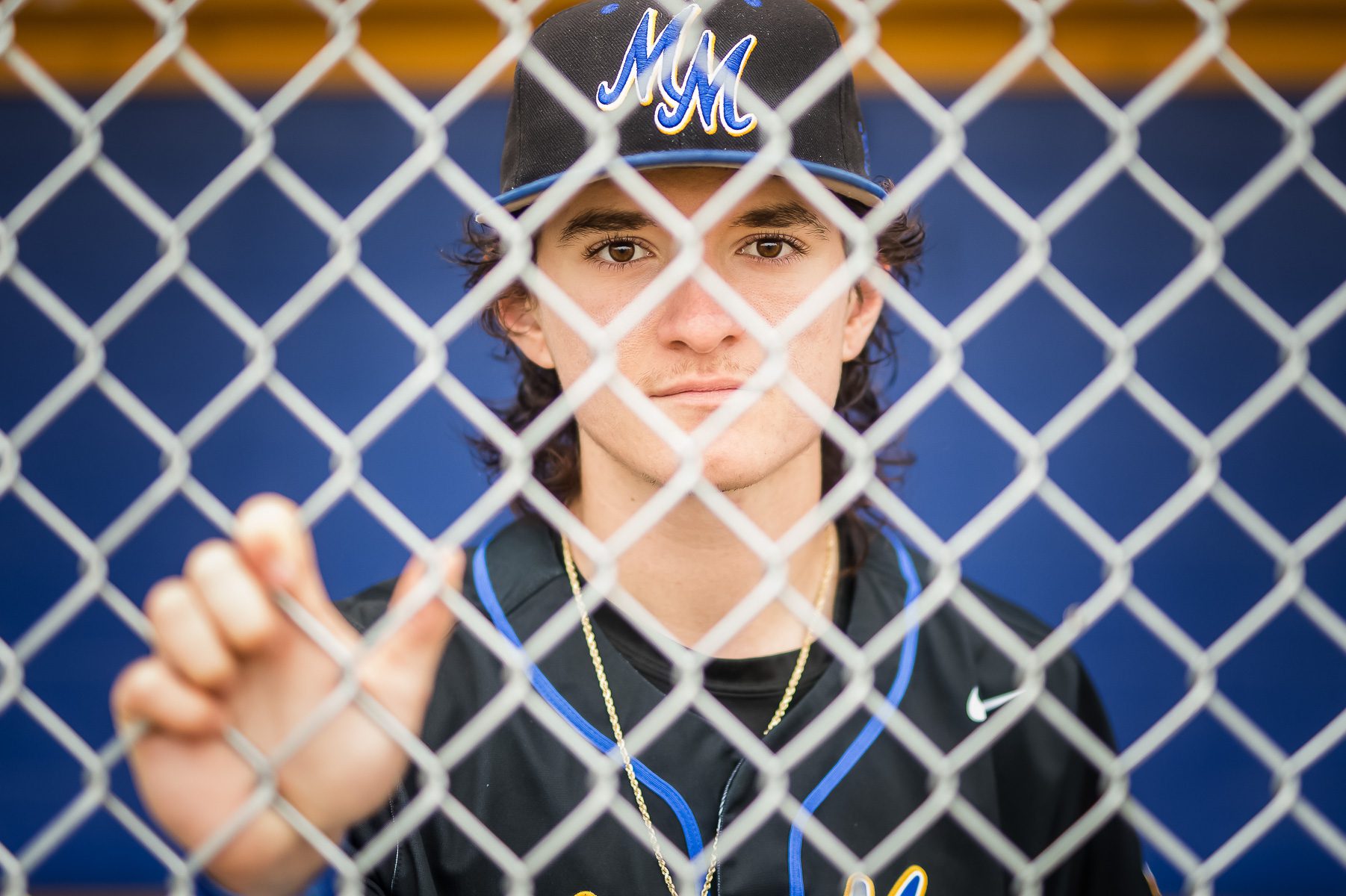 A senior student athlete on his senior photograph